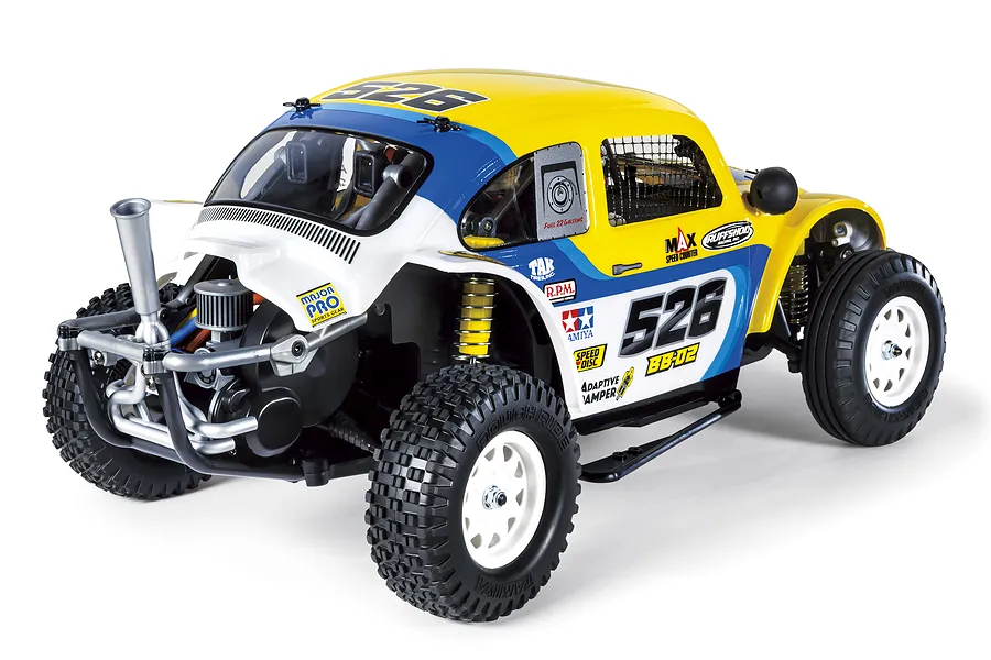 Rear three-quarter studio view of the Tamiya BB-02 Volkswagen Dune Beetle Cross RC buggy in yellow, blue, and white with racing decals.