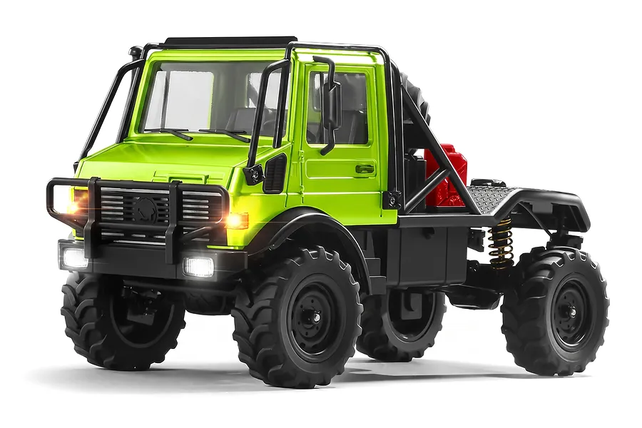 Green MN Model Unimog RC rock crawler truck featuring a black roll cage, large off-road tires, and lit headlights against a white background.