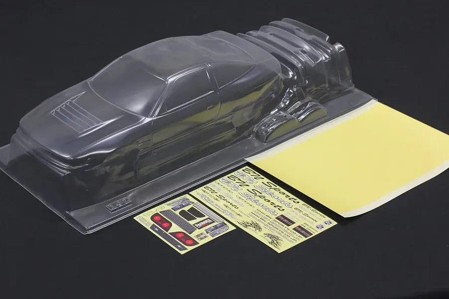 Pandora RC clear unpainted 1/10 scale Nissan Sil80 BN Sports body shell with included decal sheets and mask.