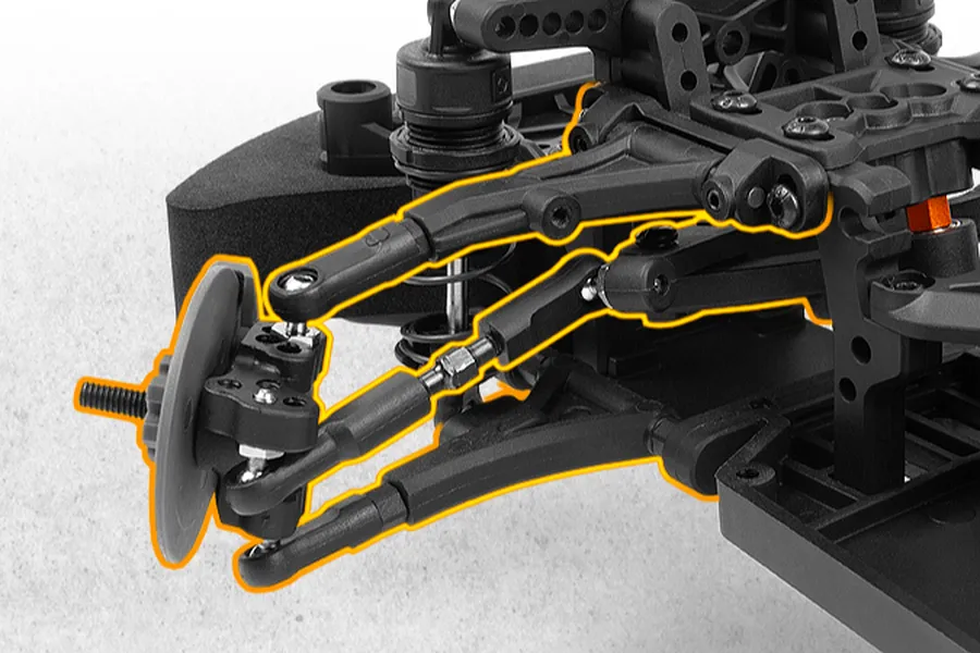 Close-up studio shot of the front suspension and steering linkage on a 1/10 scale RC drift car chassis, with orange highlights.