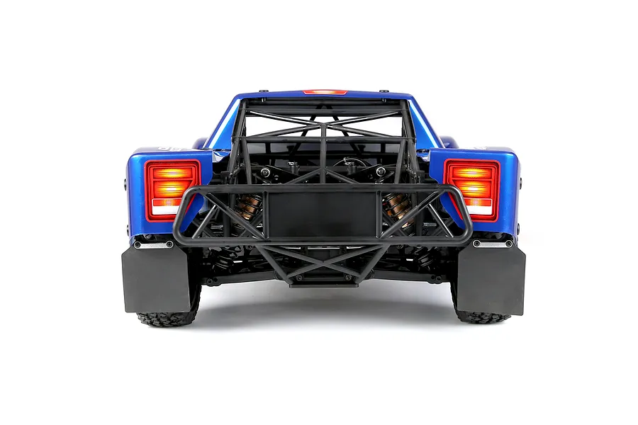 Rear view of the Rovan ELT320S V2 RC short course truck showing its blue body, internal roll cage, illuminated tail lights, and mud flaps against a white background.
