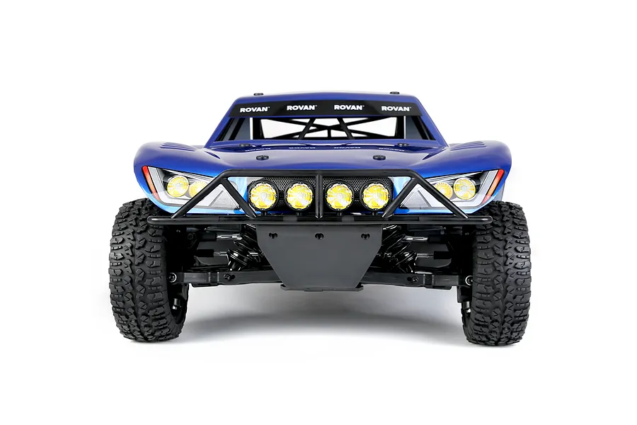 Front view of the Rovan ELT320S V2 RC short course truck in blue with a black front bumper and auxiliary lights.