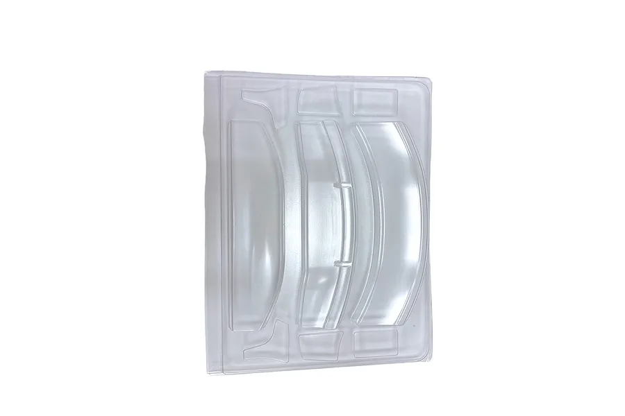 Unpainted clear polycarbonate RC GT wing set parts on a molded sheet against a white background.