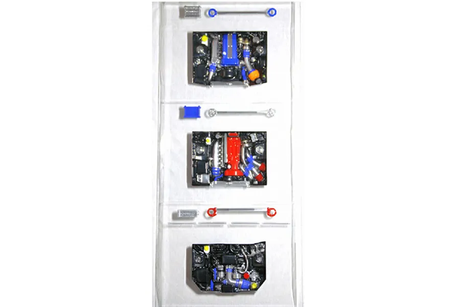 Pandora RC scale model engine bay accessory set with detailed engine blocks, pipes, and struts arranged on a white background.