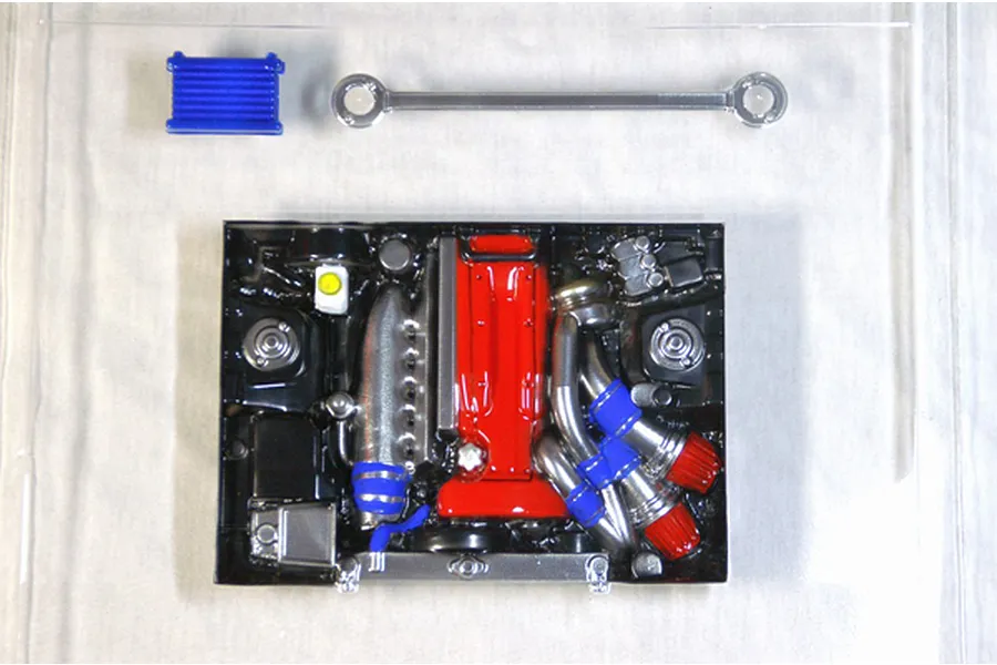 Pandora RC scale model engine set parts including a detailed red and black engine bay, blue intercooler, and silver strut bar.