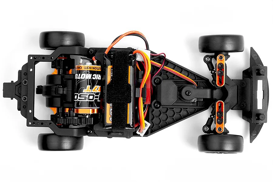 Top down view of the internal chassis layout of an HPI Stage D24 RC car showing the motor, battery, and electronics.