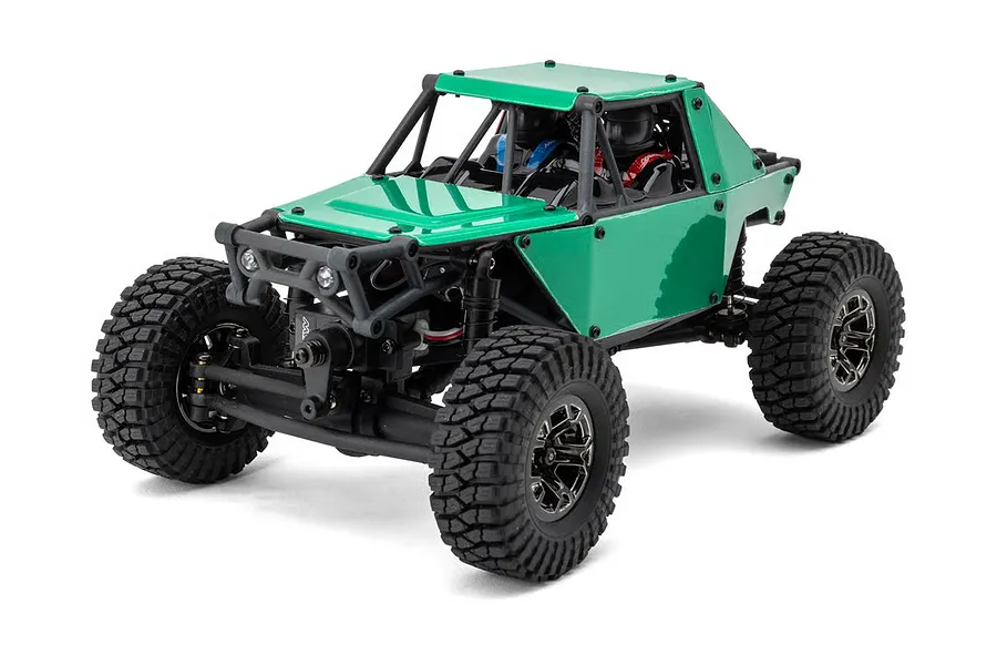 Green Maverick Scout-24 Flux 1/24 scale RC rock crawler studio product shot against a white background.
