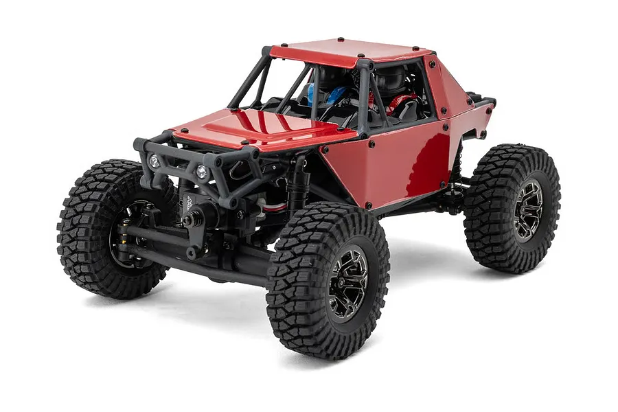 Studio shot of the Maverick Scout-24 RC rock crawler in red against a clean white background.