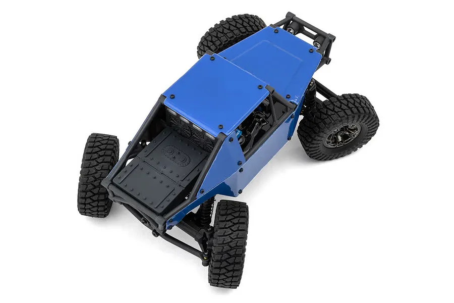 High angle studio view of the blue Maverick Scout-24 RC rock crawler showing body panels and tires.