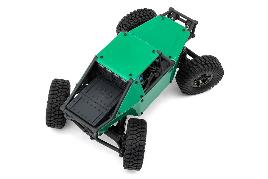 High angle studio shot of the green Maverick Scout-24 Flux RC rock crawler showcasing its cage and tires.