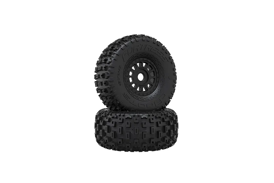 Two black Arrma dBoots Fortress glued RC wheels and tyres with aggressive tread patterns stacked against a white background.