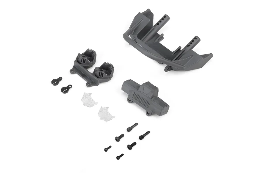 Axial front bumper set in gray with associated mounting hardware and small plastic parts laid out on a white background.