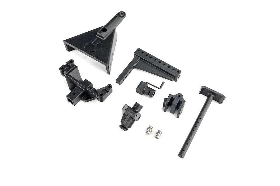 Top-down view of the Axial Hitch and Receiver Set for the SCX10 trailer, showing black molded plastic hitch parts and metal ball studs on a white background.