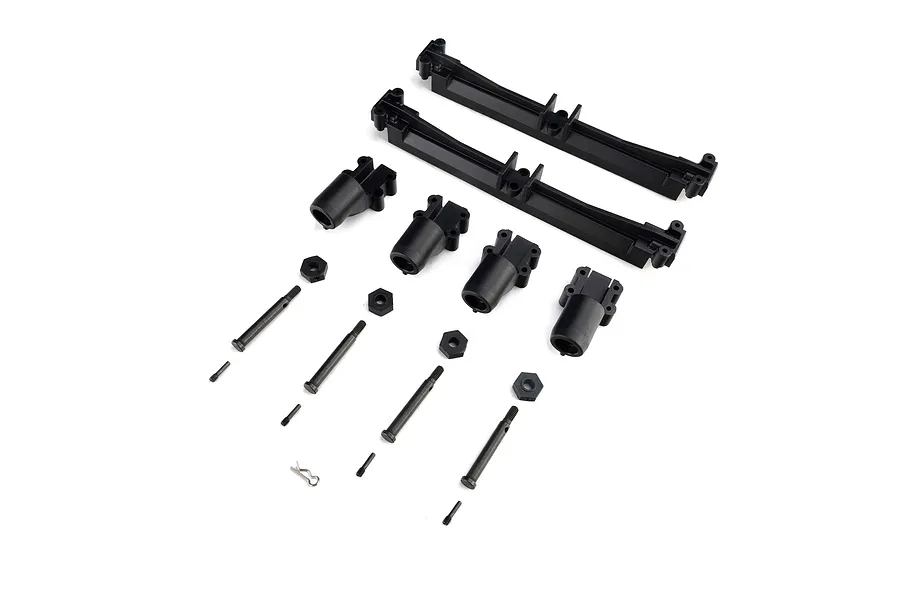 Axial Axle Parts Set for SCX10 trailer showing molded plastic axle housings, leaf spring mounts, hardware, and metal screws on a white background.