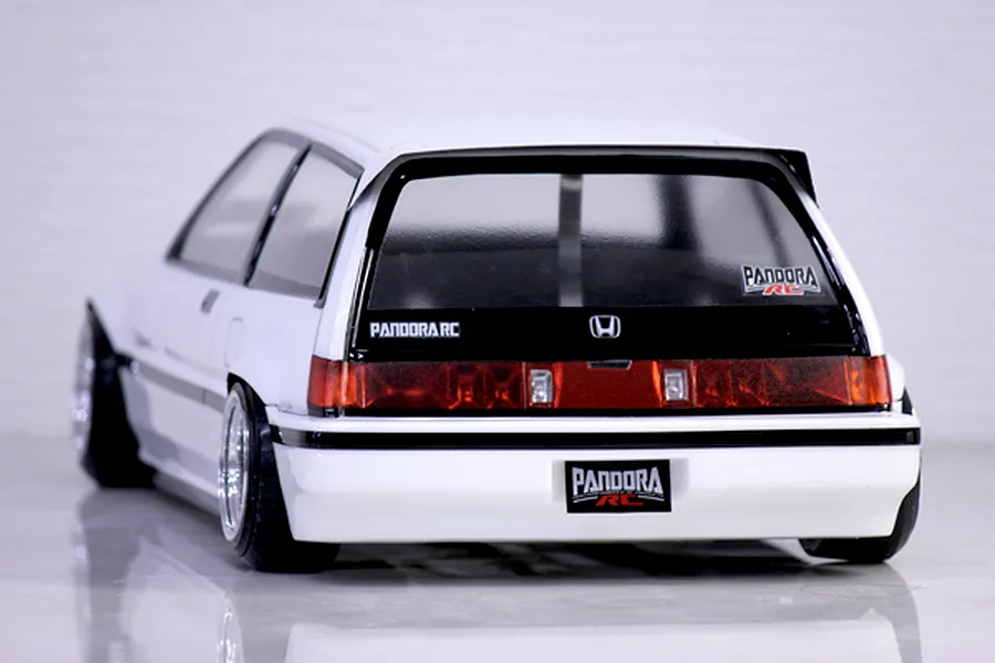 Rear three-quarter view of a white Honda Civic RC body shell featuring detailed taillights and Pandora RC decals on a white background.