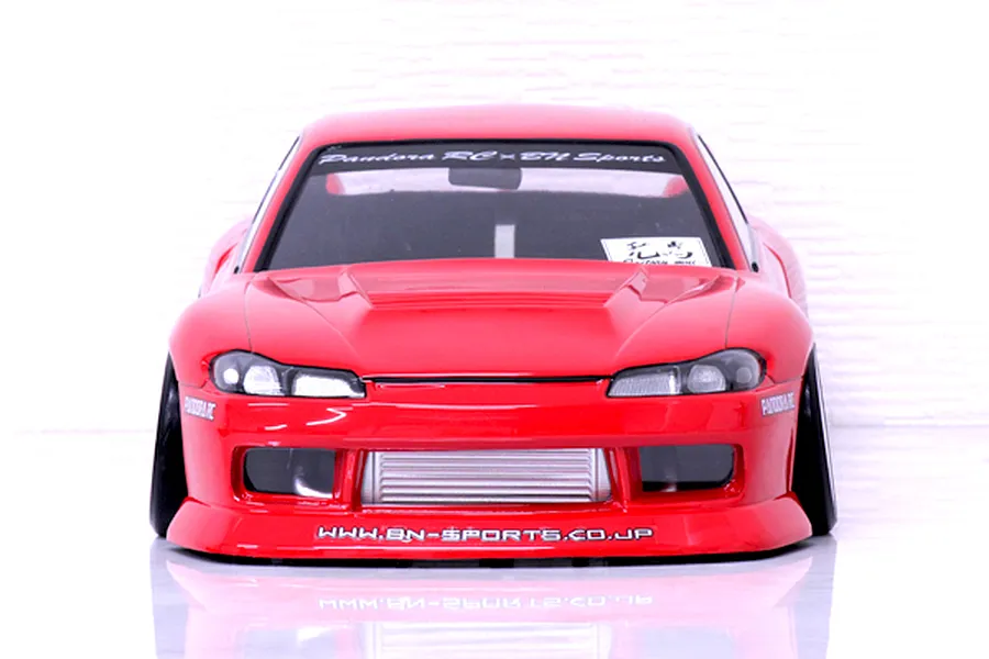 Front view of a red Pandora RC S15 Silvia BN Sports body shell with visible front bumper, intercooler, and decal details.