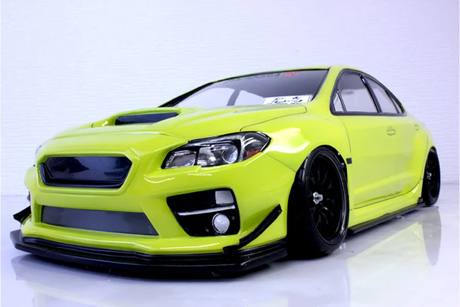 A painted fluorescent yellow Subaru WRX STI RC drift body shell mounted on a chassis with black wheels against a white background.
