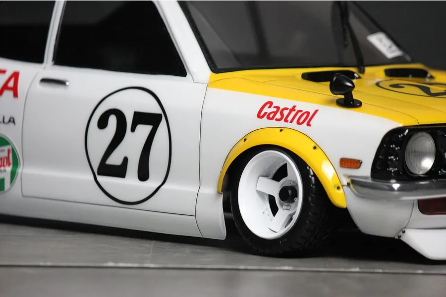 Close-up of the front quarter of a painted Toyota Corolla Levin TE27 RC body shell with Castrol livery and number 27 decals.