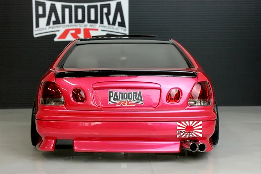 Rear view of a pink Pandora RC drift car body with dual exhaust pipes and Pandora RC branding.