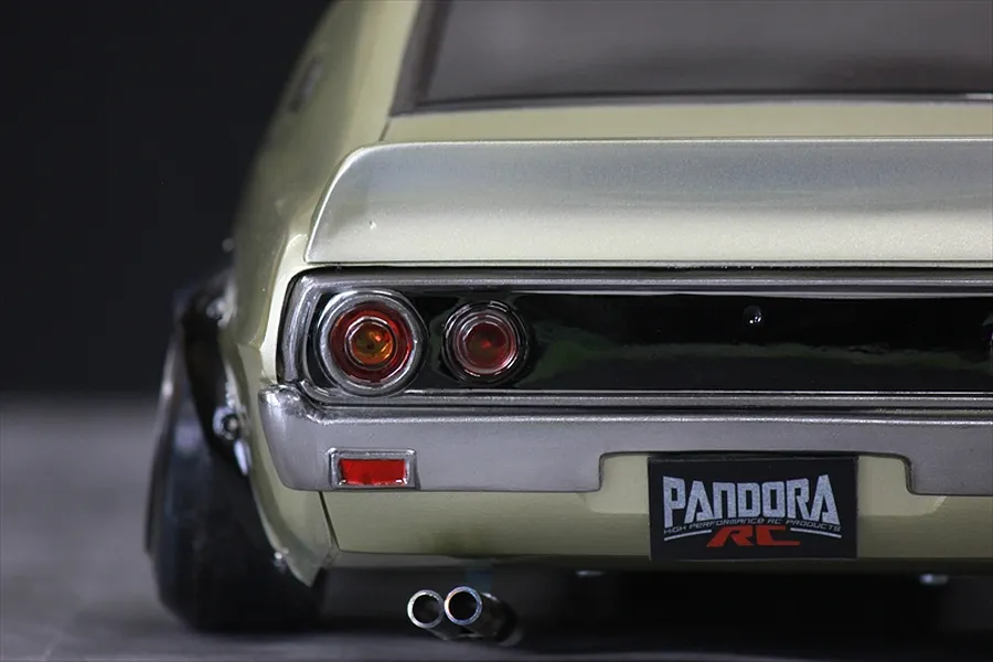Close-up rear view of Pandora RC KPGC110 Skyline 2000GT-R RC body shell showing taillights and dual exhaust.
