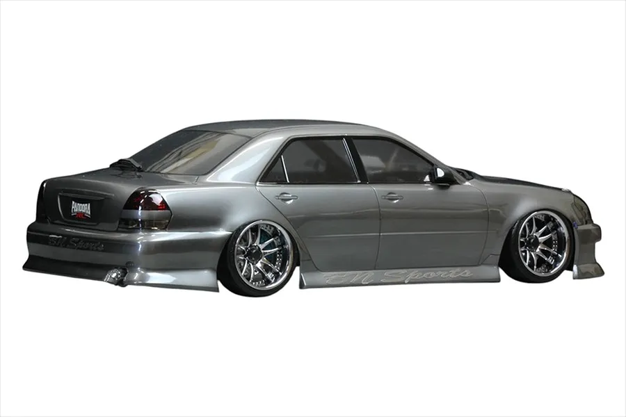Side-rear view of a painted grey RC drift car body shell featuring chrome multi-spoke wheels and BN Sports decals.