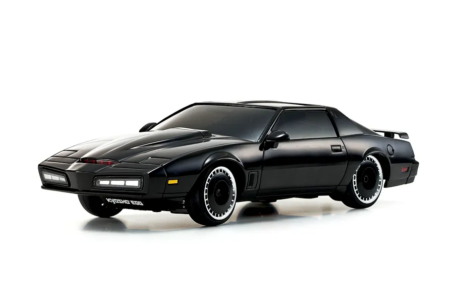 Studio product photo of the Kyosho Mini-Z Knight Rider RC car, featuring a sleek black body and distinctive front scanner light against a white background.