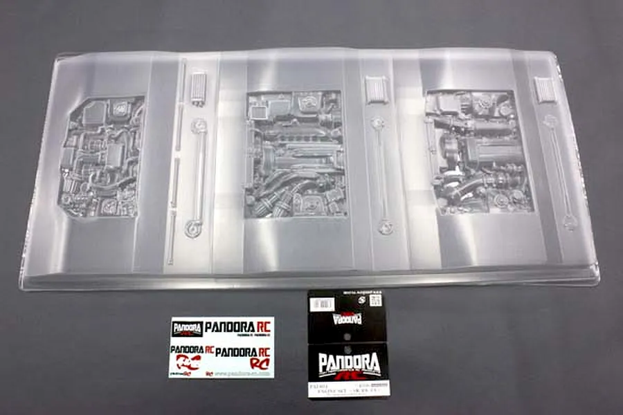 Unpainted clear polycarbonate RC engine set parts sheet by Pandora RC with decals and header card.