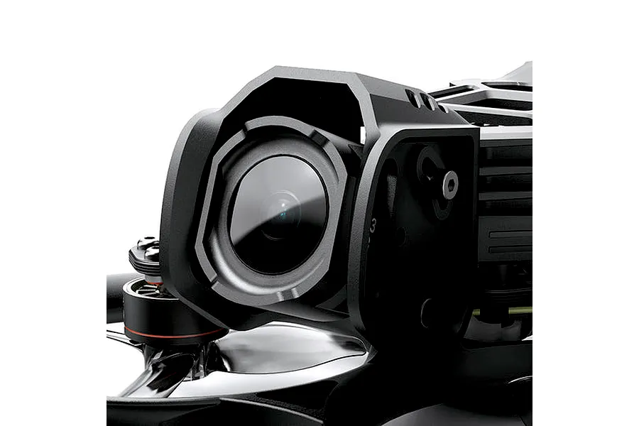 Close-up studio product shot of the FPV drone camera mount and protective housing on the BetaFPV Pavo20 Pro II.