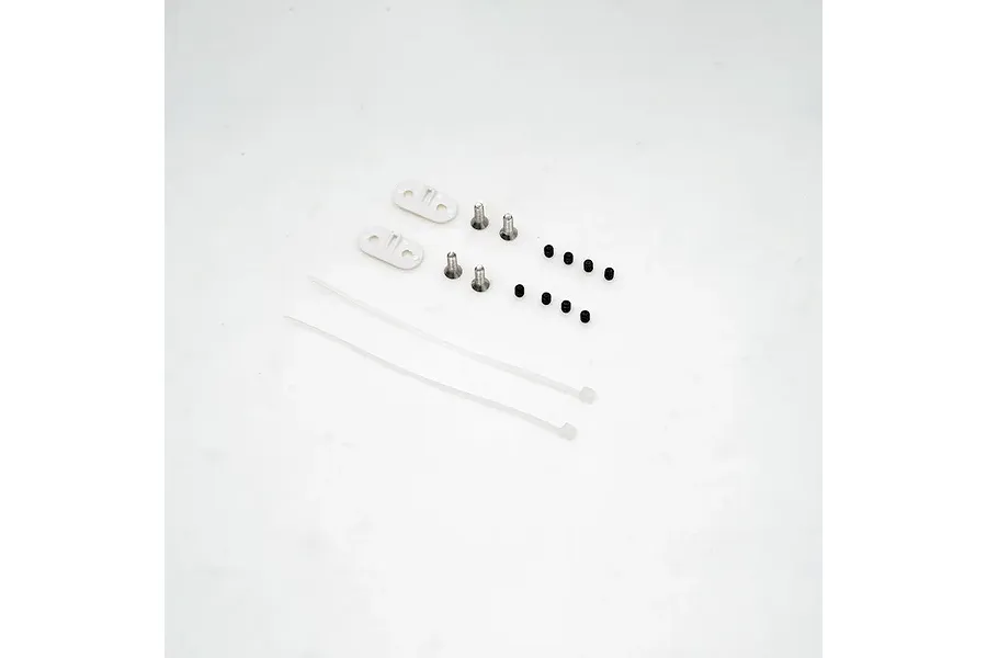 FMS Float Accessory Kit hardware including mounting plates, screws, zip ties, and small grommets on a white surface.