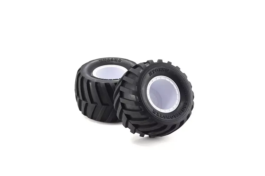 Two Kyosho Sand Monster RC monster truck tyres mounted and glued on white plastic rims against a white background.