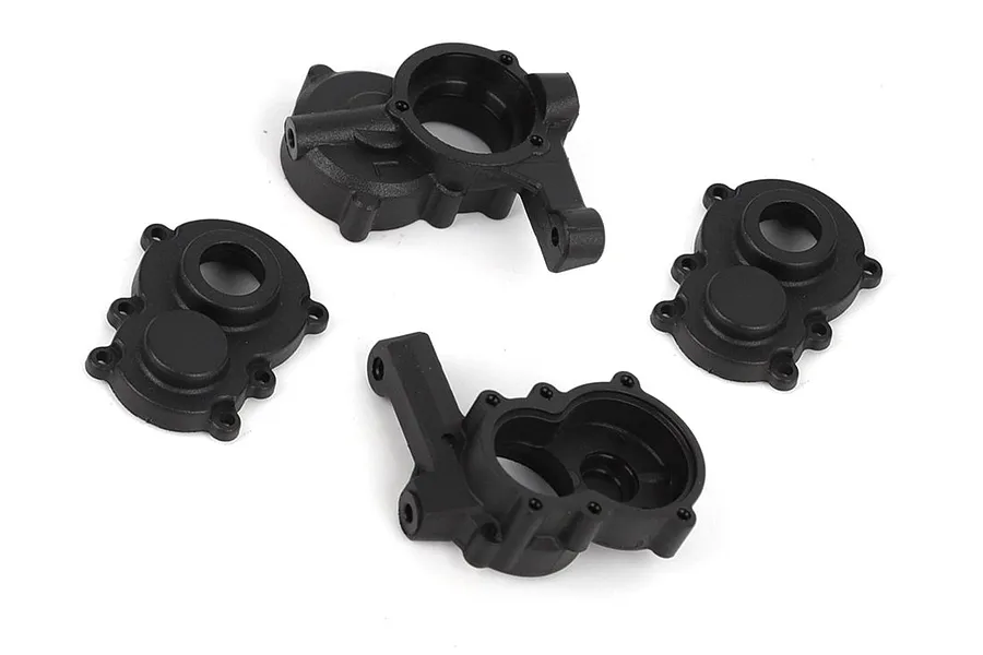 Four black plastic portal axle case parts displayed on a white background, representing RGT portal axle cases.