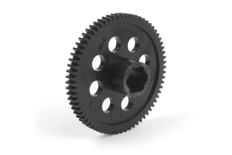 A black plastic RC spur gear with multiple lightening holes and a central splined hub, isolated on a white background.