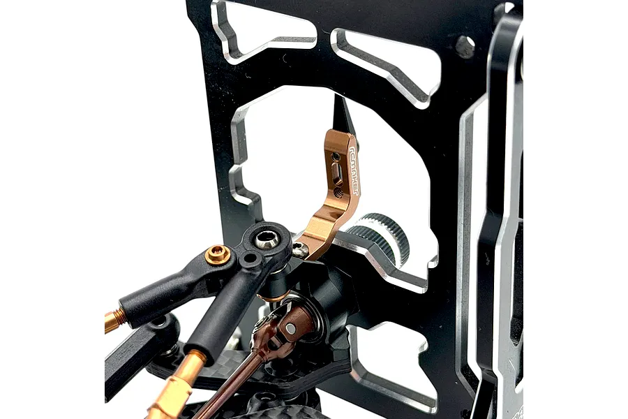 Close-up view of an RC Maker adjustable caster tool installed on an RC car suspension assembly against a white background.