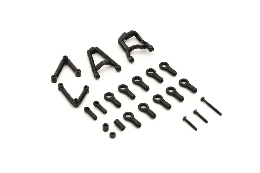 Kyosho suspension parts set including black plastic suspension arms, rod ends, and metal screws on a white background.