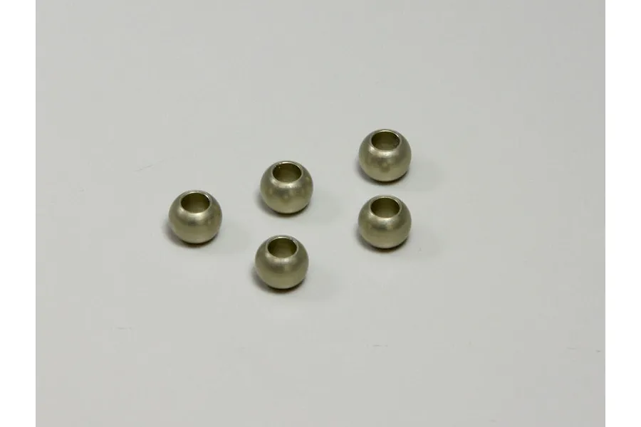 Five small silver metal pivot balls arranged on a plain white background.