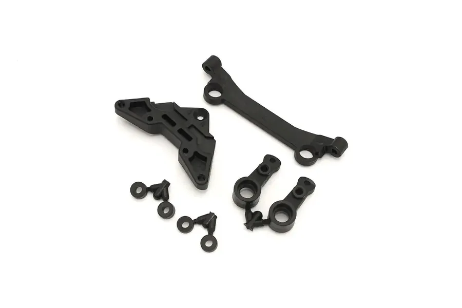 Kyosho black plastic RC parts set including mount brackets and small linkages on a plain white background.