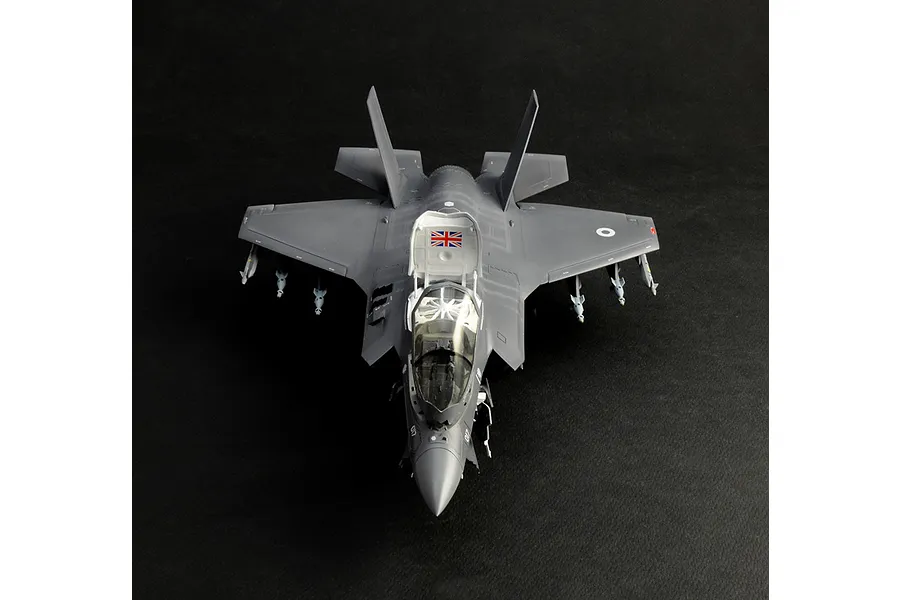 Top front view of a completed and painted plastic model of an F-35B Lightning II fighter jet with British markings.