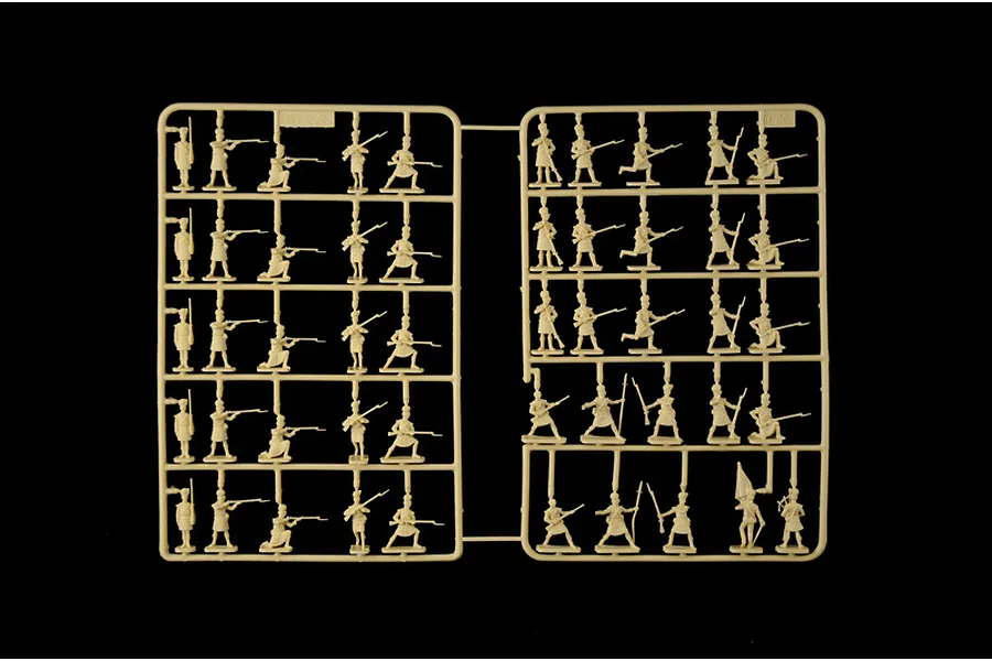 Tan plastic model kit sprue containing unbuilt Highlander infantry soldier figures against a black background.