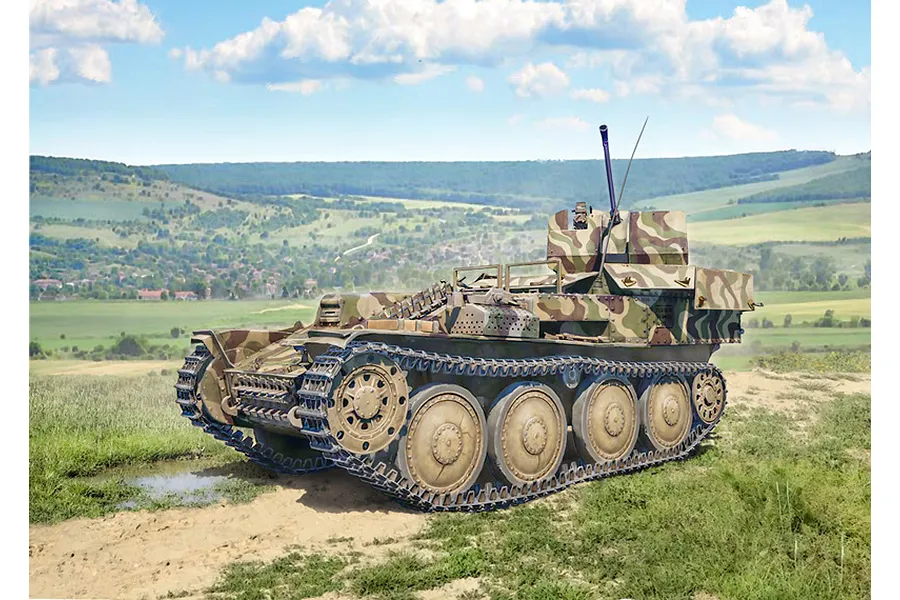 Painted plastic model kit of a German Flakpanzer 38 Gepard anti-aircraft vehicle with camouflage, parked in a grassy field.