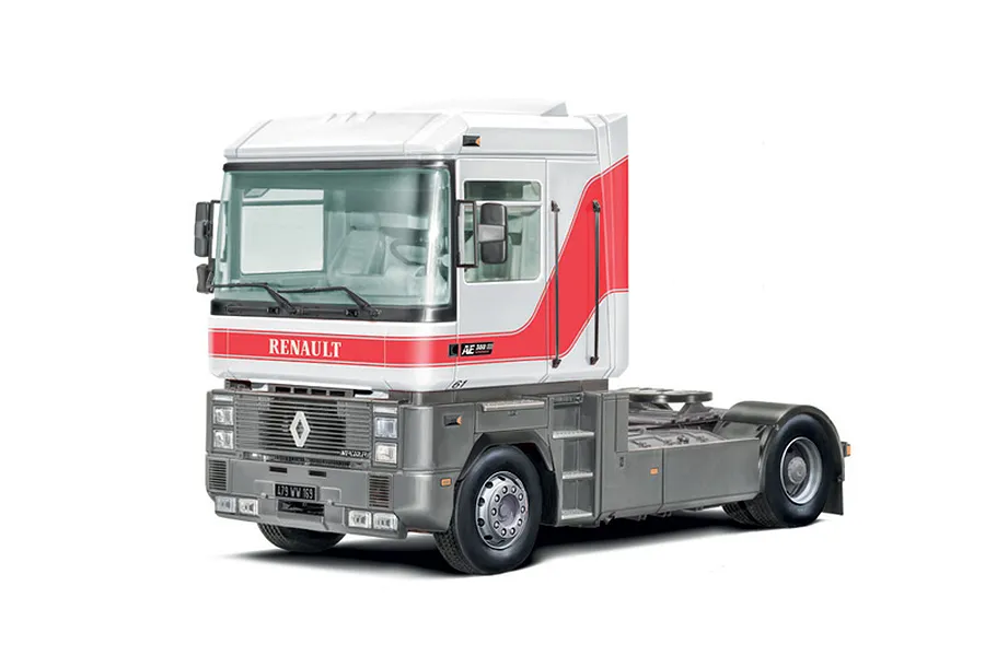 A completed and painted 1/24 scale model of a white and grey Renault AE500 Magnum semi truck against a plain white background.