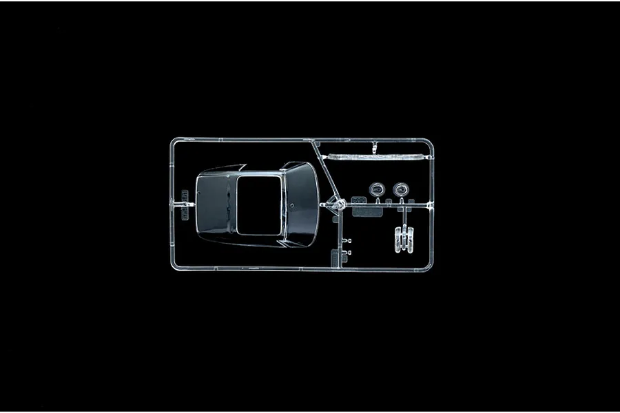 Clear plastic parts sprue featuring a windshield and windows for the Italeri 1/24 Porsche 911 Turbo model kit.