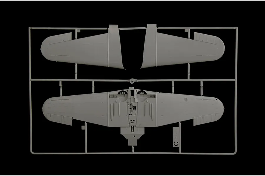 Grey plastic model kit sprue containing aircraft wing parts for the Italeri SBD-3 Dauntless bomber.
