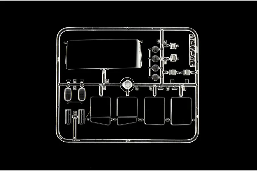 Clear plastic model kit parts sprue containing windows and lenses for the Italeri IVECO Cow-Boy Semi Truck.