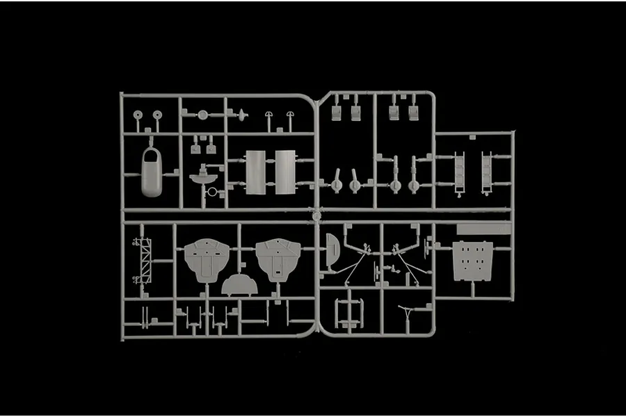 Grey plastic model kit parts sprue containing interior bulkheads, seats, and structural components.