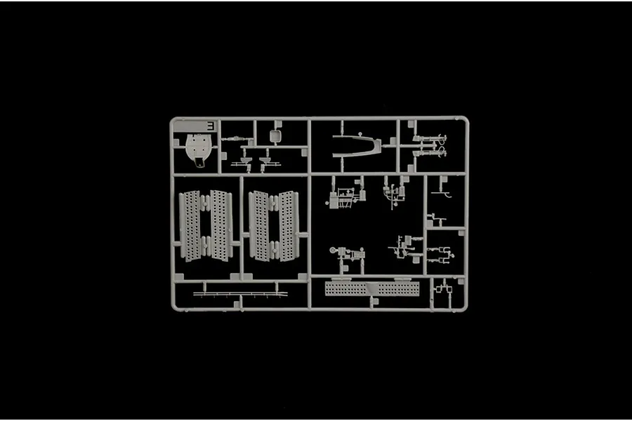 Grey plastic model kit sprue part labeled with the number 3 against a black background.