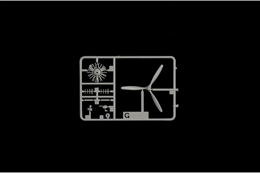 Grey plastic model kit sprue piece G featuring an aircraft engine and a three-bladed propeller.