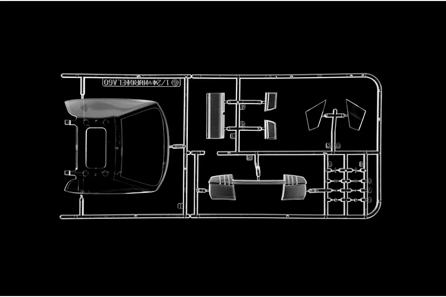 Clear plastic model kit sprue containing windows and transparent parts for a 1/24 scale Lamborghini Murcielago model car against a black background.