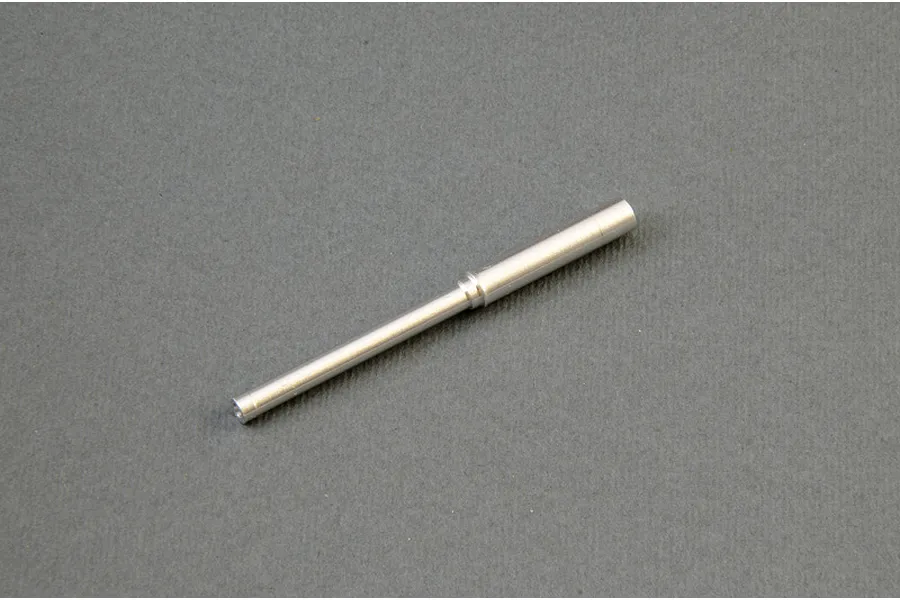 An aftermarket turned metal tank gun barrel upgrade part placed on a solid grey background.