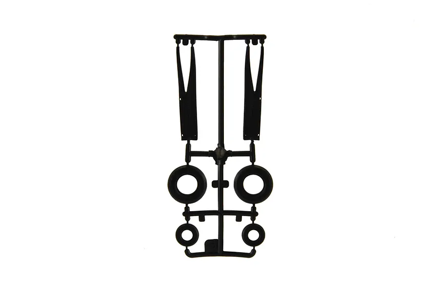 Black plastic model kit parts sprue showing wheels and structural components against a white background.
