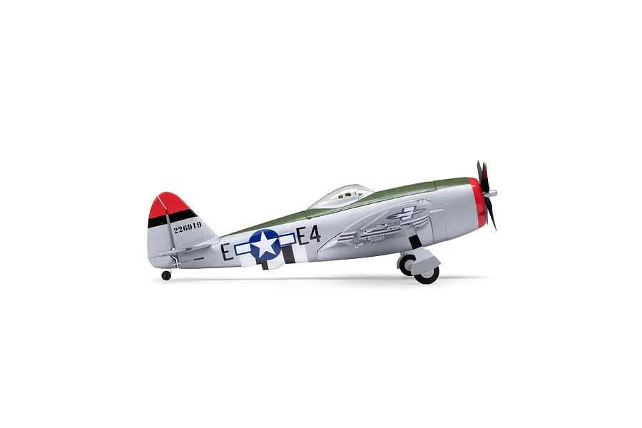 Studio side profile shot of the E-Flite Micro P-47 Thunderbolt RC warbird airplane in silver, green, and red livery.